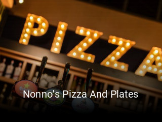 Nonno's Pizza And Plates book table
