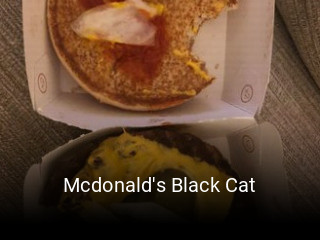Book a table now at Mcdonald's Black Cat